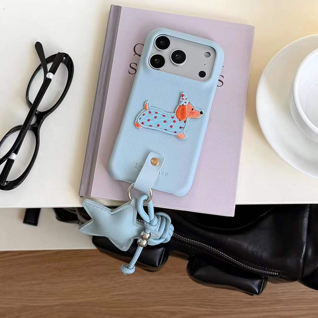 Stylish Dog Motif Phone Case with Grip Strap and Elegant Star Charm