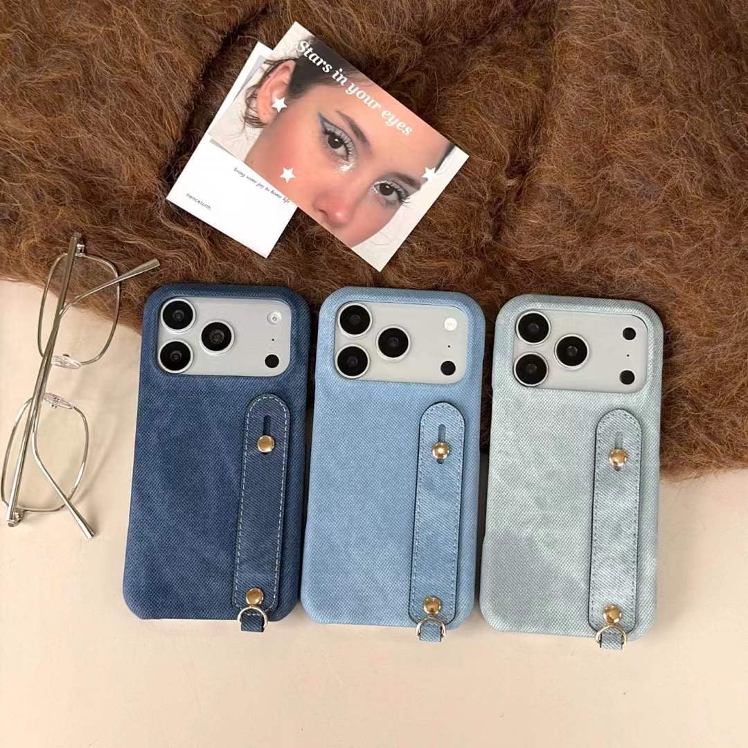 Modern Denim Finish Phone Case with Secure Hand Strap Design