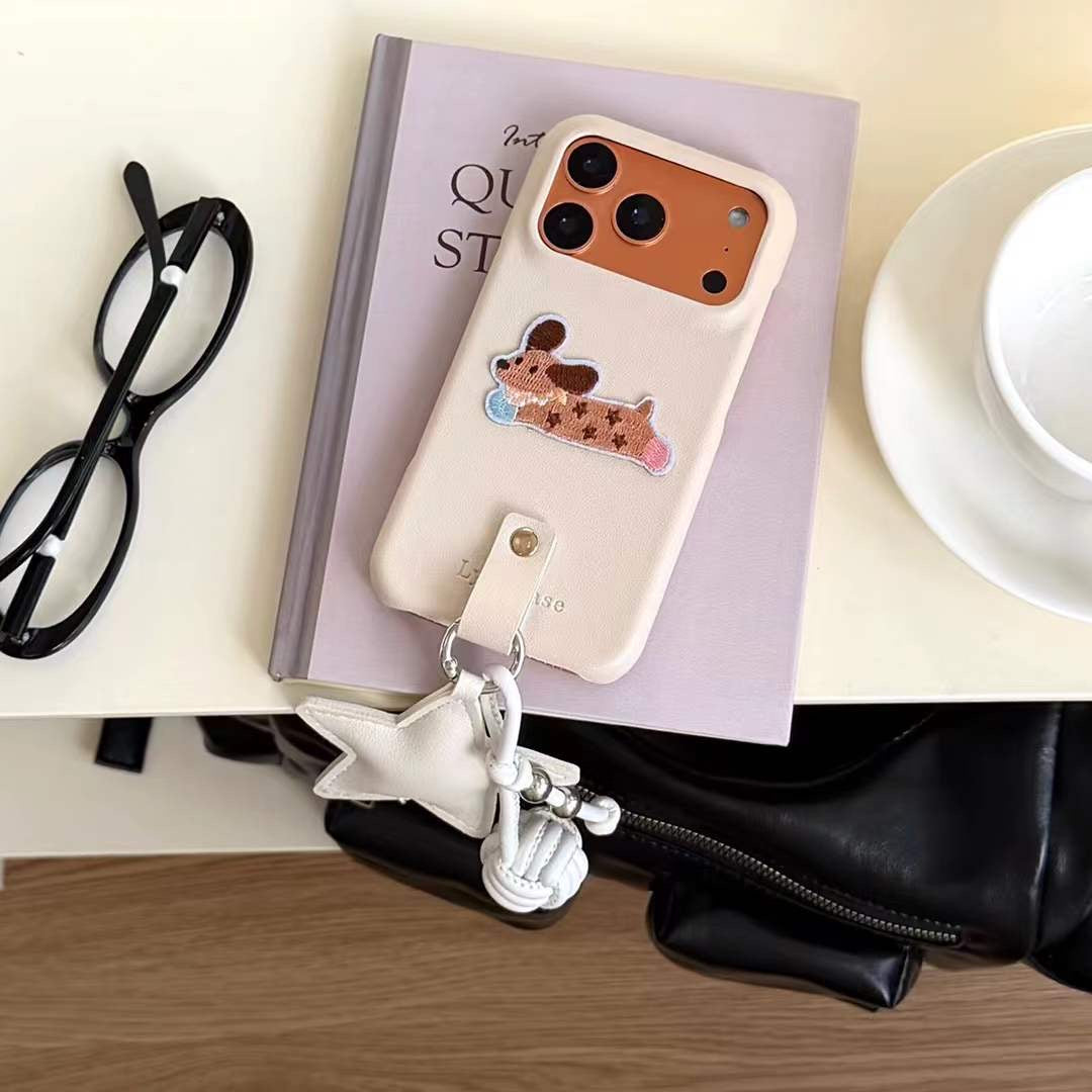 Stylish Dog Motif Phone Case with Grip Strap and Elegant Star Charm