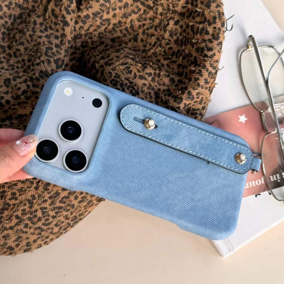 Modern Denim Finish Phone Case with Secure Hand Strap Design